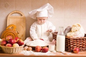Baby Chef Playing In Kitchen